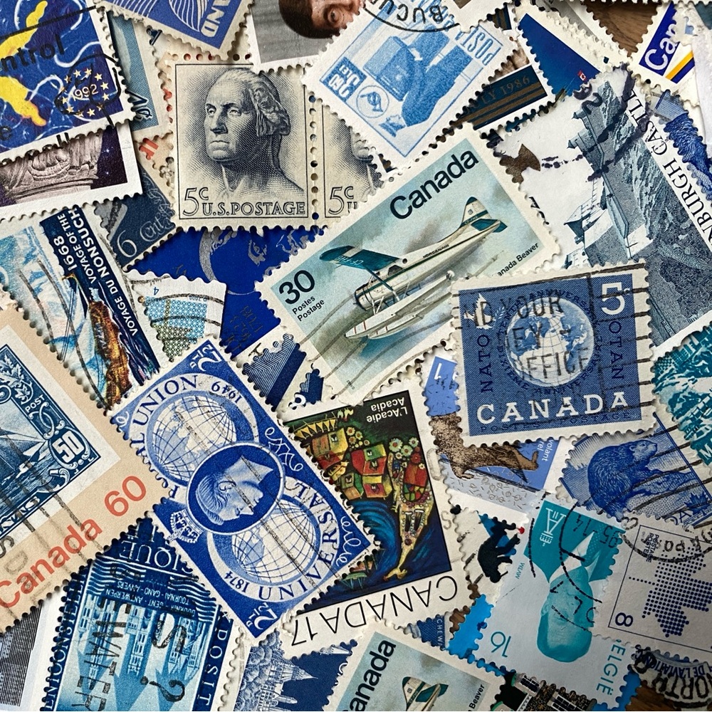 100+ blue postage stamps
